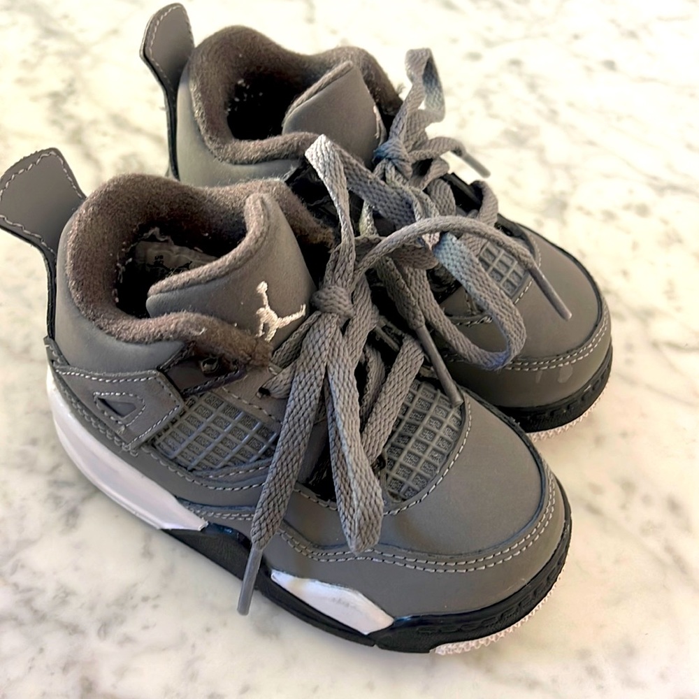 Gray and white toddler Jordans size 5c